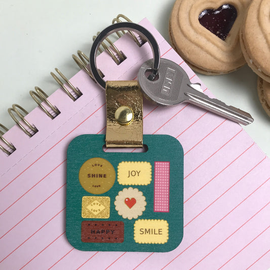 Joyous Bites of Magic Biscuit Tin Keyring