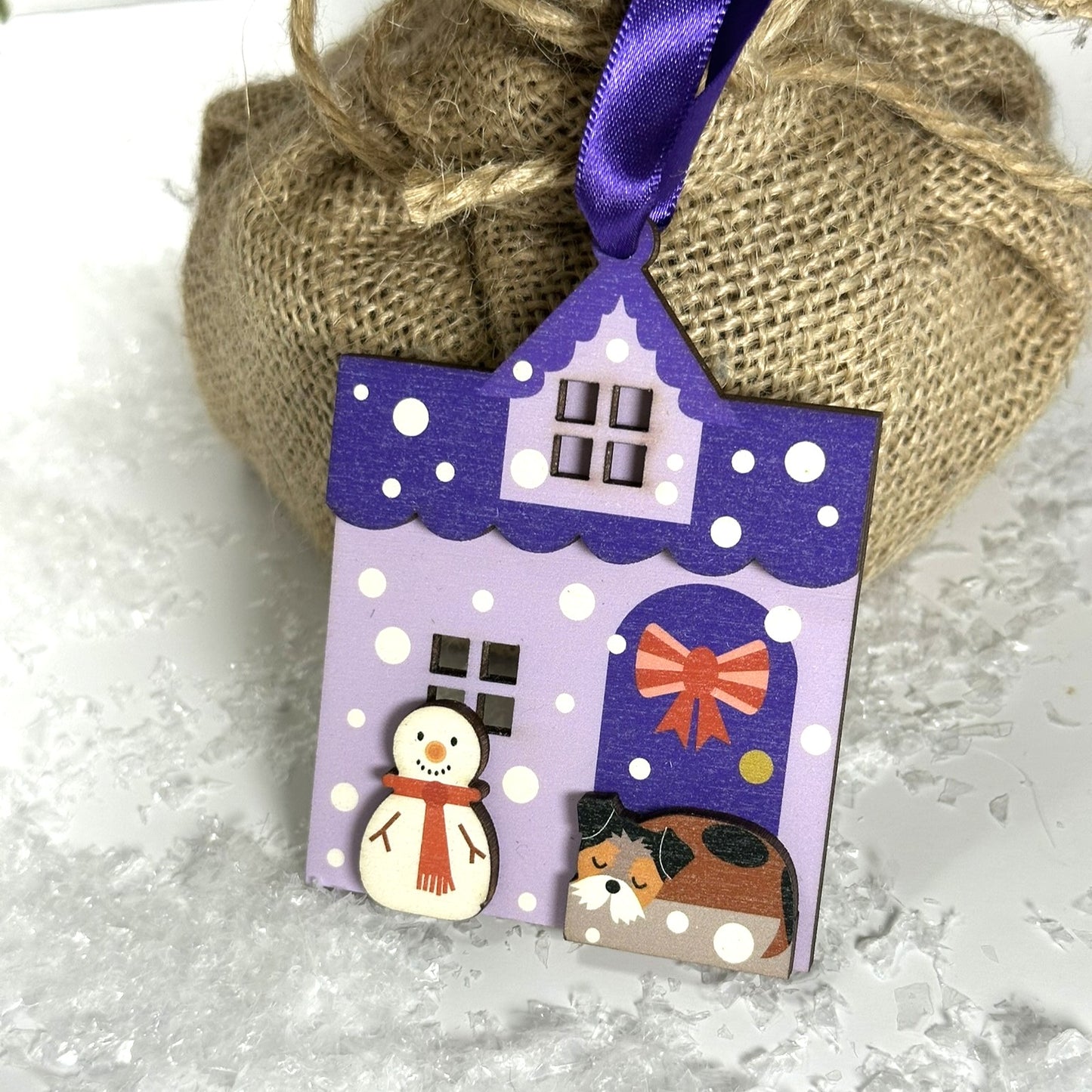 Purple Snowy House Christmas Decoration, with sleepy Terrier Dog