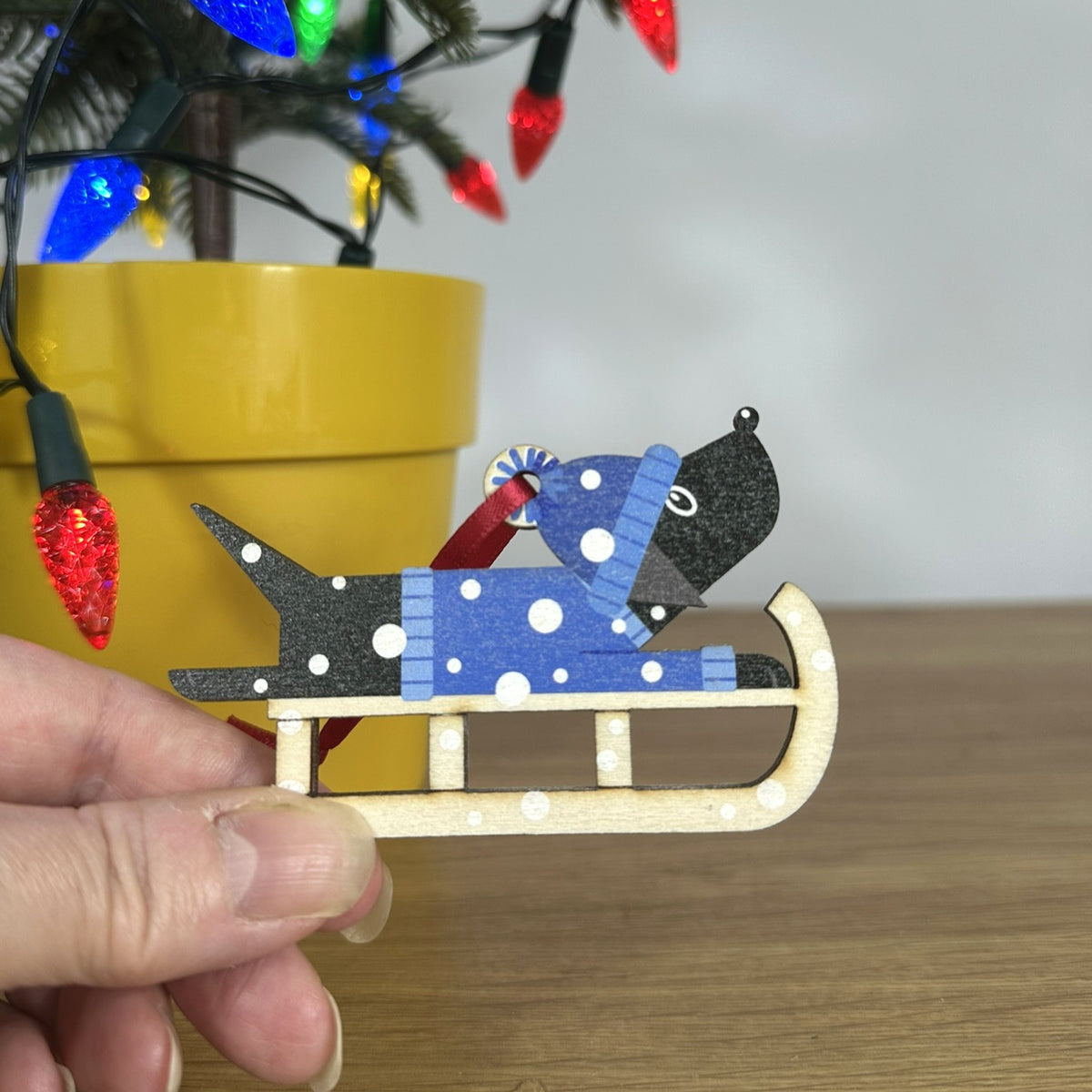 Black Labrador Dog on a Christmas Sledge - Tree Decoration