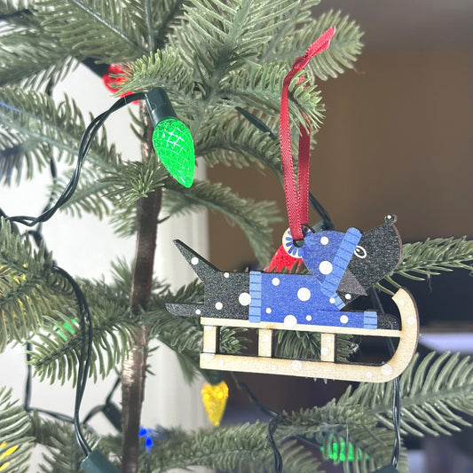 Black Labrador Dog on a Christmas Sledge - Tree Decoration