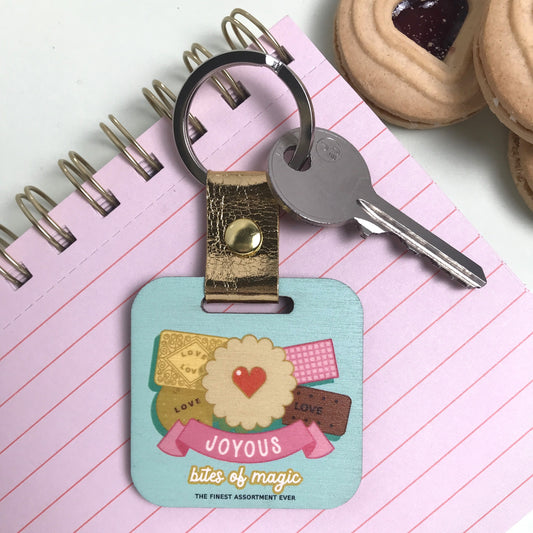 Joyous Bites of Magic Biscuit Tin Keyring